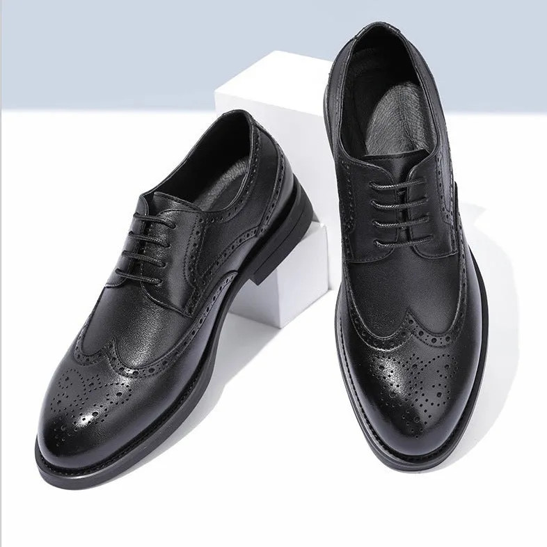 Men's black brogue leather shoes with wingtip perforations and lace-up closure on neutral background
