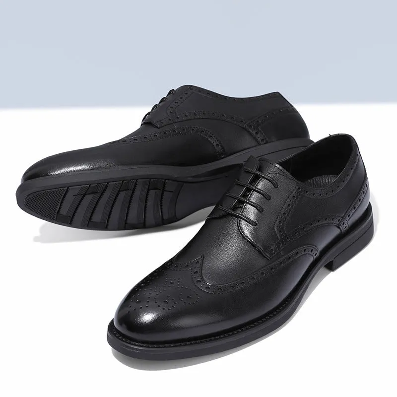 Men's black brogue leather shoes with wingtip perforations and lace-up closure on neutral background