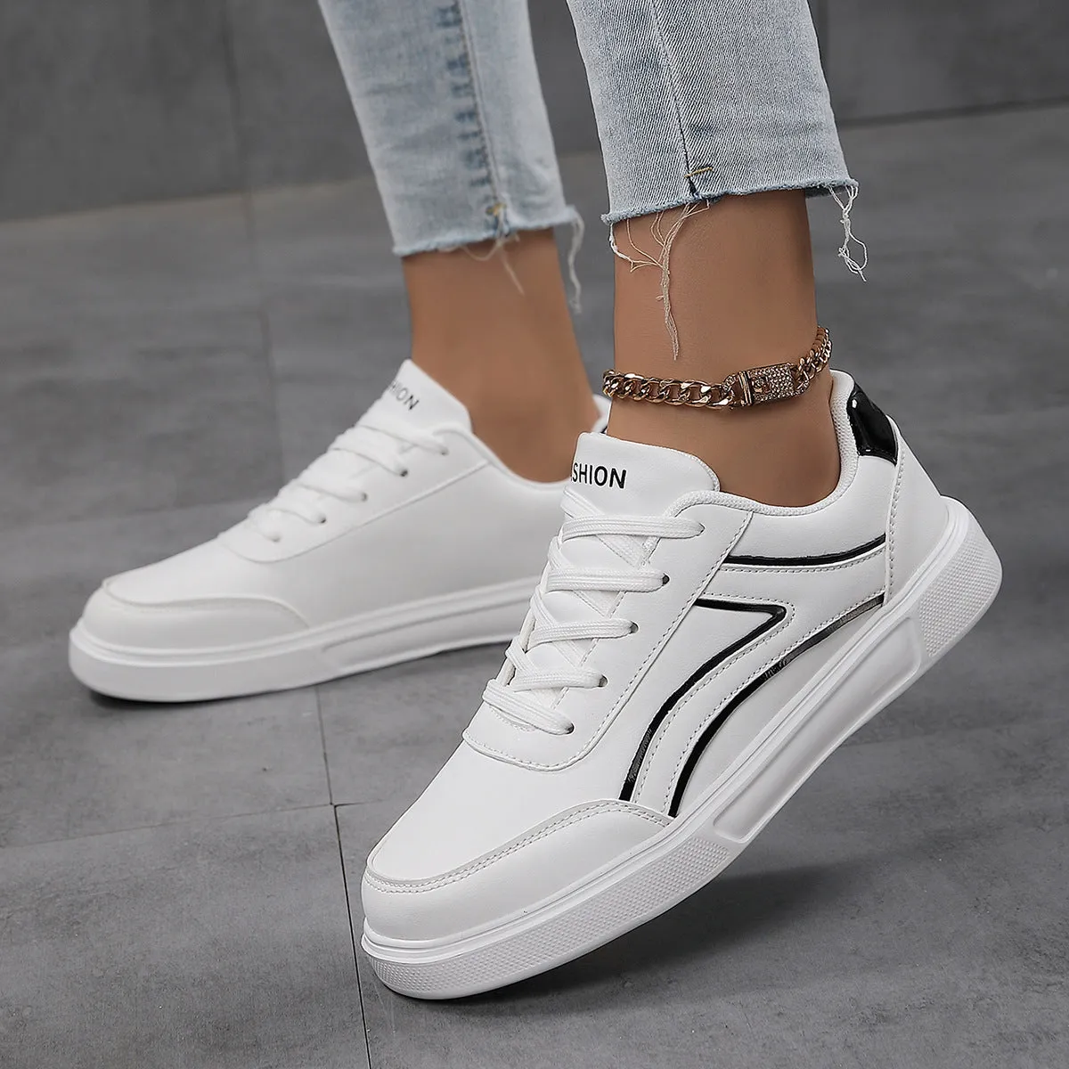 Plus size female board shoes with breathable mesh upper and rubber sole in solid colour low top style