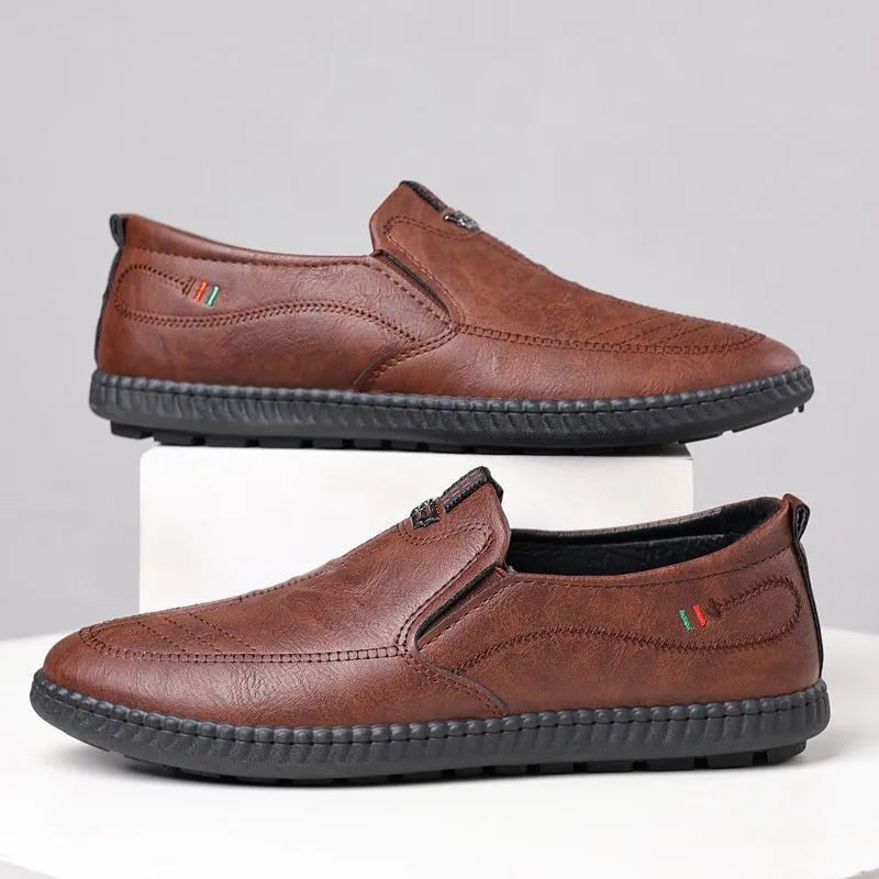 Men's casual solid colour low top leather shoes with round toe, available in black and brown sizes 39-44
