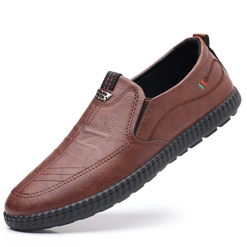 Men's casual solid colour low top leather shoes with round toe, available in black and brown sizes 39-44