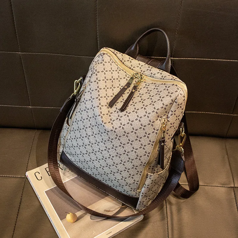 Large capacity retro crossbody backpack with floral print in brown, waterproof PVC material, anti-theft design for travel
