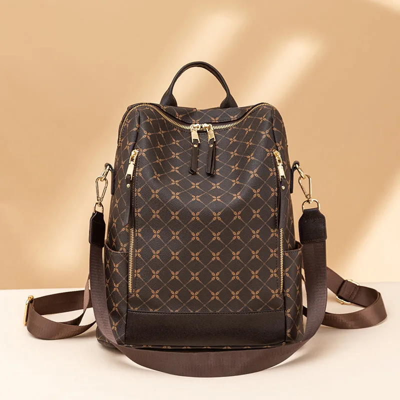 Large capacity retro crossbody backpack with floral print in brown, waterproof PVC material, anti-theft design for travel