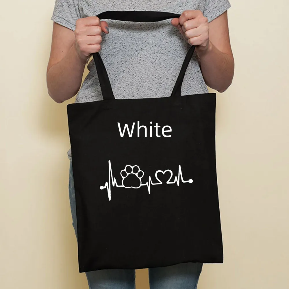 Sausage dog printed canvas bag in black with white dog design on front, sturdy tote for everyday use