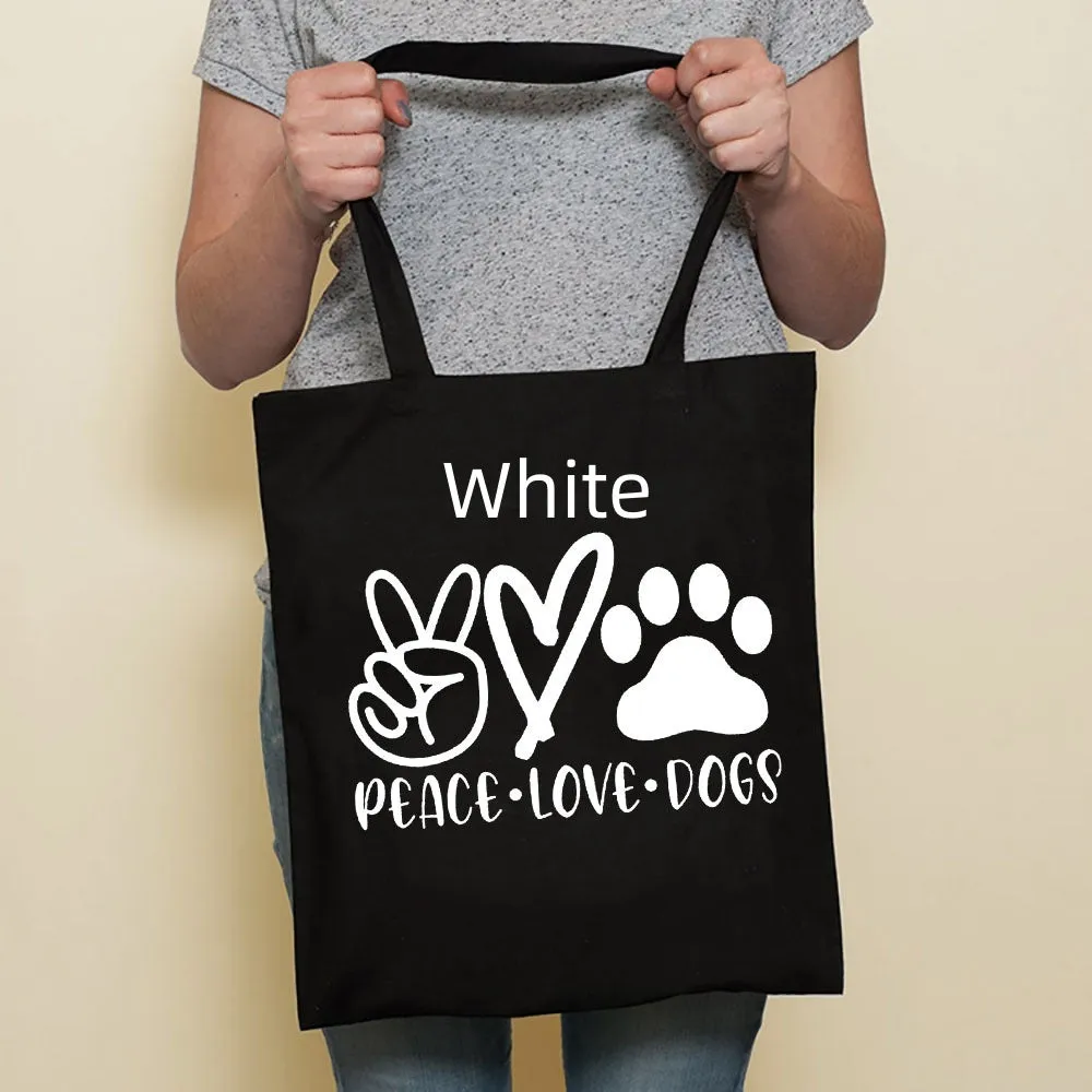 Sausage dog printed canvas bag in black with white dog design on front, sturdy tote for everyday use