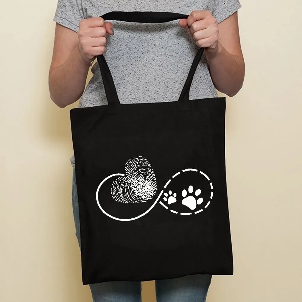 Sausage dog printed canvas bag in black with white dog design on front, sturdy tote for everyday use