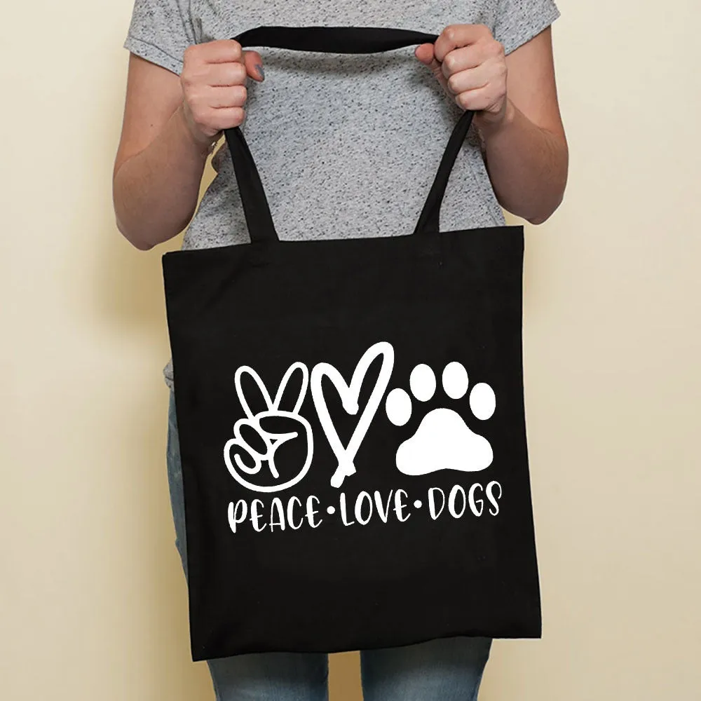 Sausage dog printed canvas bag in black with white dog design on front, sturdy tote for everyday use