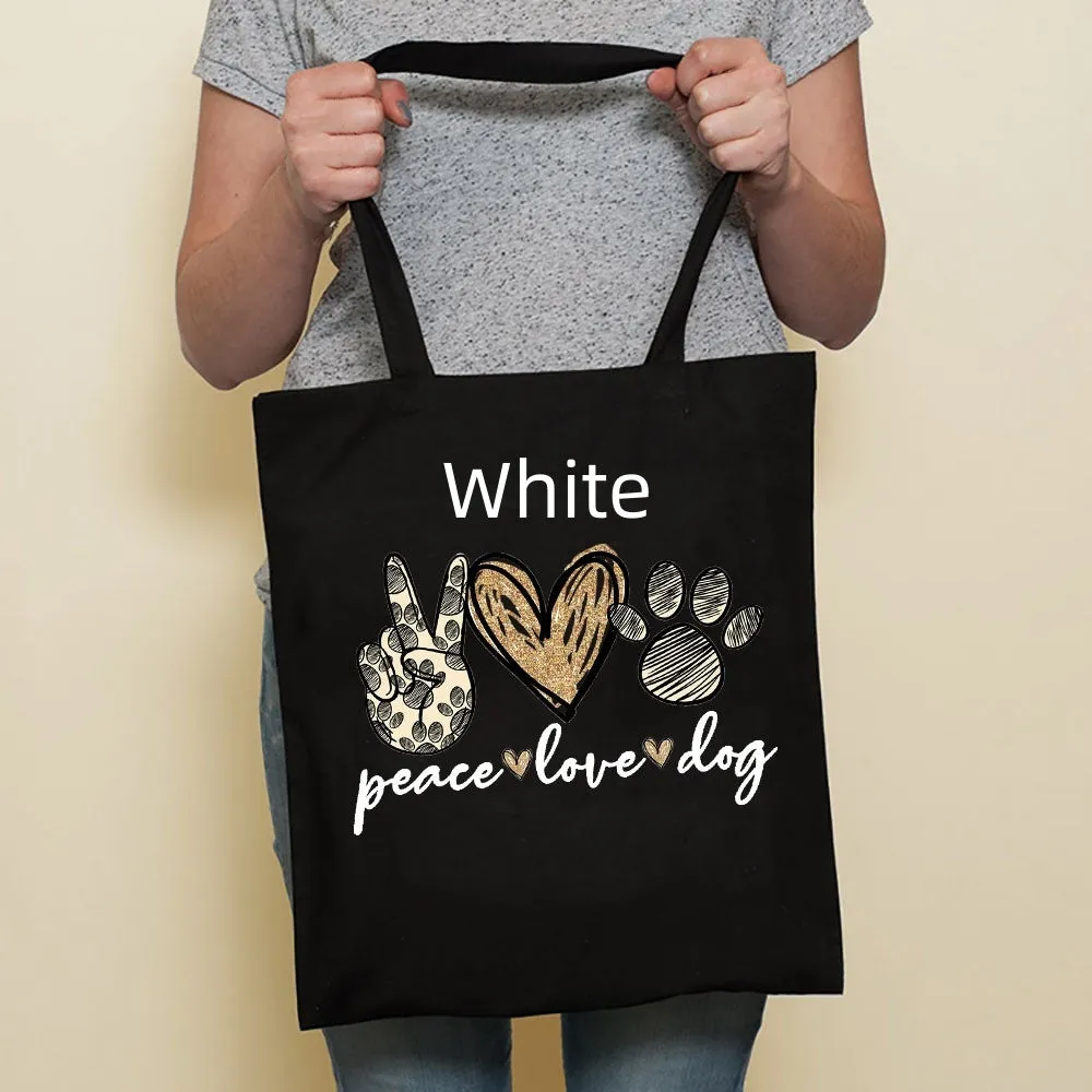 Sausage dog printed canvas bag in black with white dog design on front, sturdy tote for everyday use