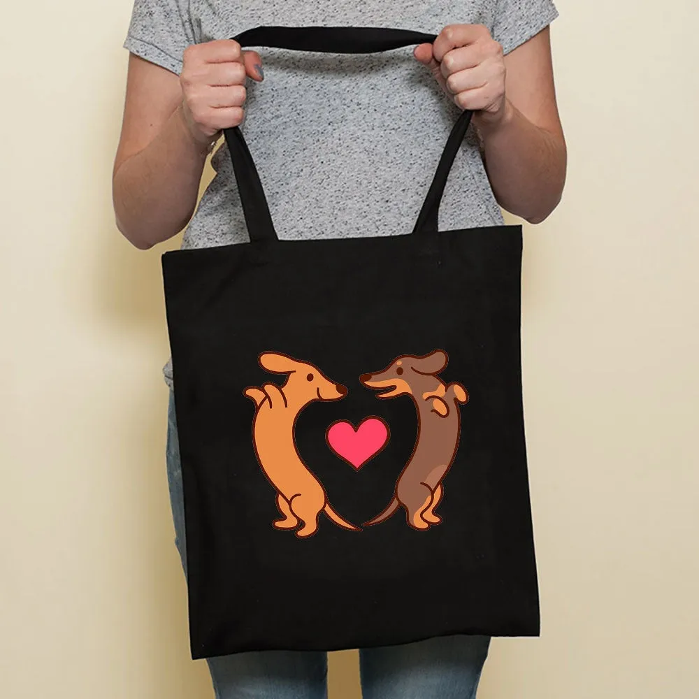 Sausage dog printed canvas bag in black with white dog design on front, sturdy tote for everyday use