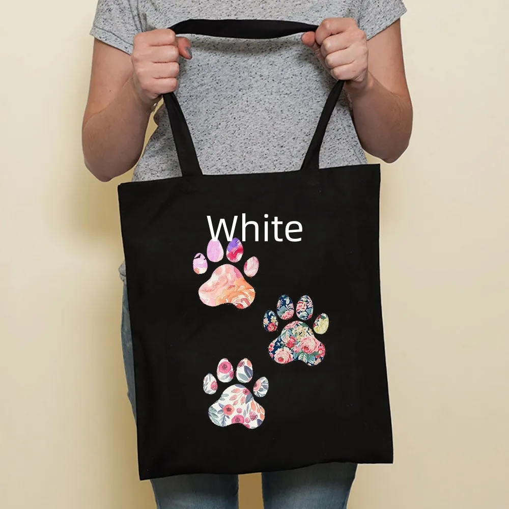 Sausage dog printed canvas bag in black with white dog design on front, sturdy tote for everyday use