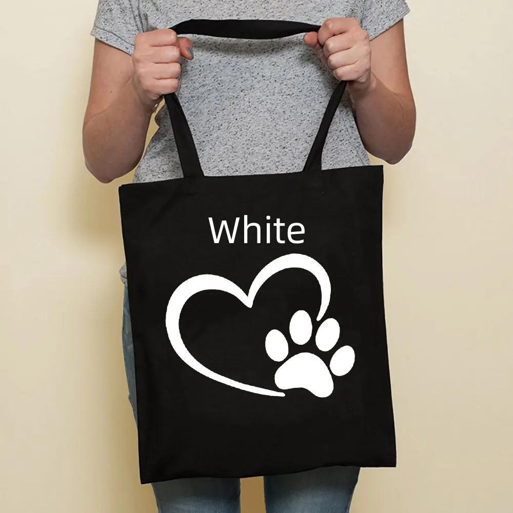 Sausage dog printed canvas bag in black with white dog design on front, sturdy tote for everyday use