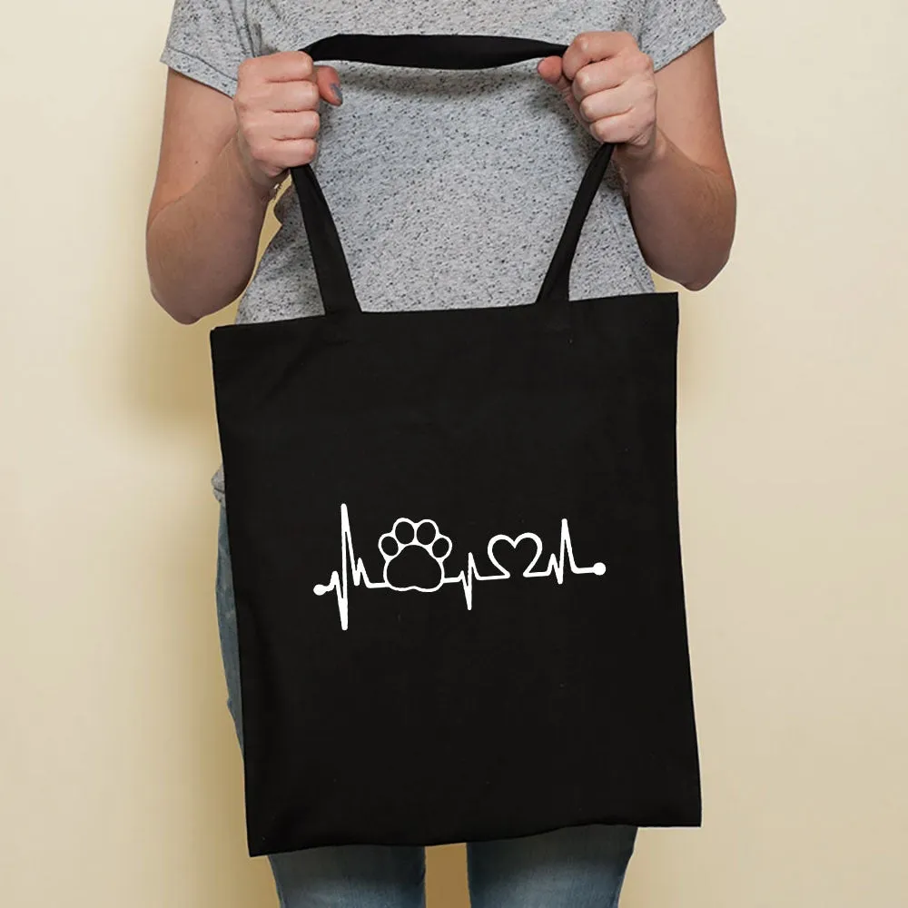 Sausage dog printed canvas bag in black with white dog design on front, sturdy tote for everyday use