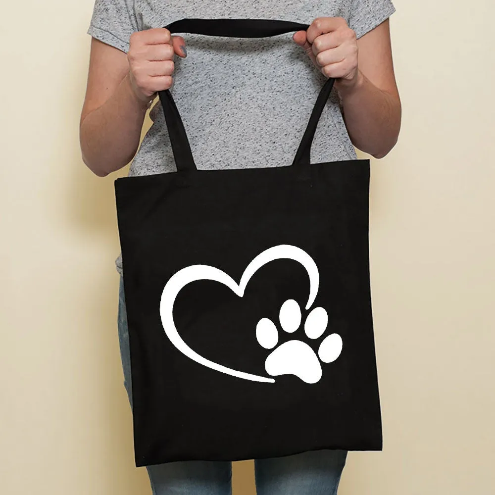 Sausage dog printed canvas bag in black with white dog design on front, sturdy tote for everyday use