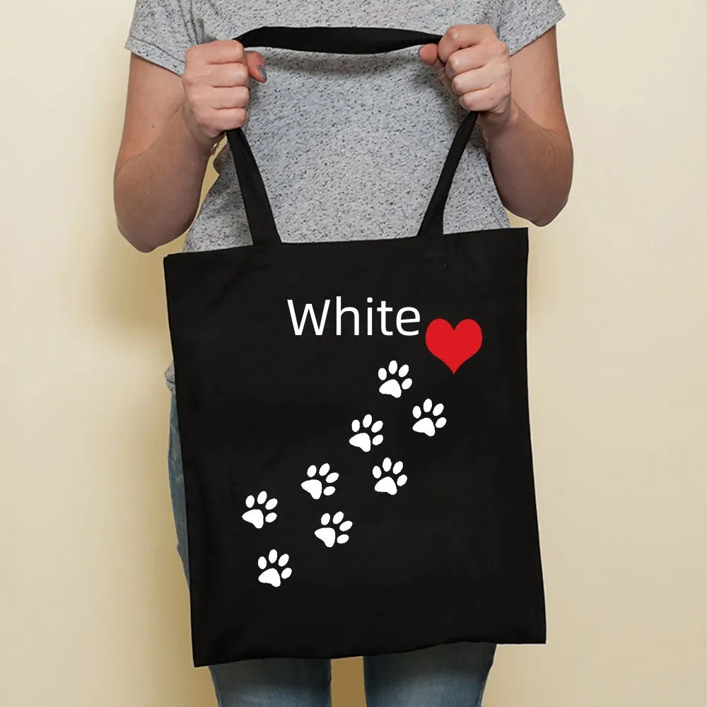Sausage dog printed canvas bag in black with white dog design on front, sturdy tote for everyday use