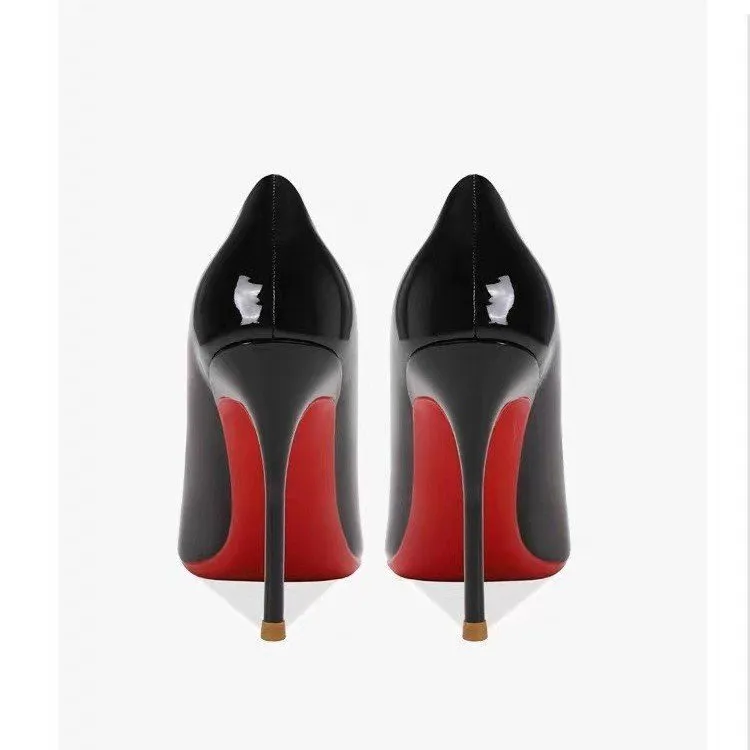 Women's pointed low-cut patent leather stiletto heels in black solid colour with stiletto heel and pointed toe