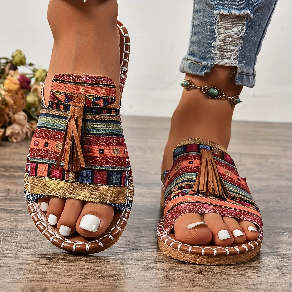 Women's tassel flat sandals in first layer cowhide with grape particle accents, Roman style, fish mouth toe, available in multiple colours