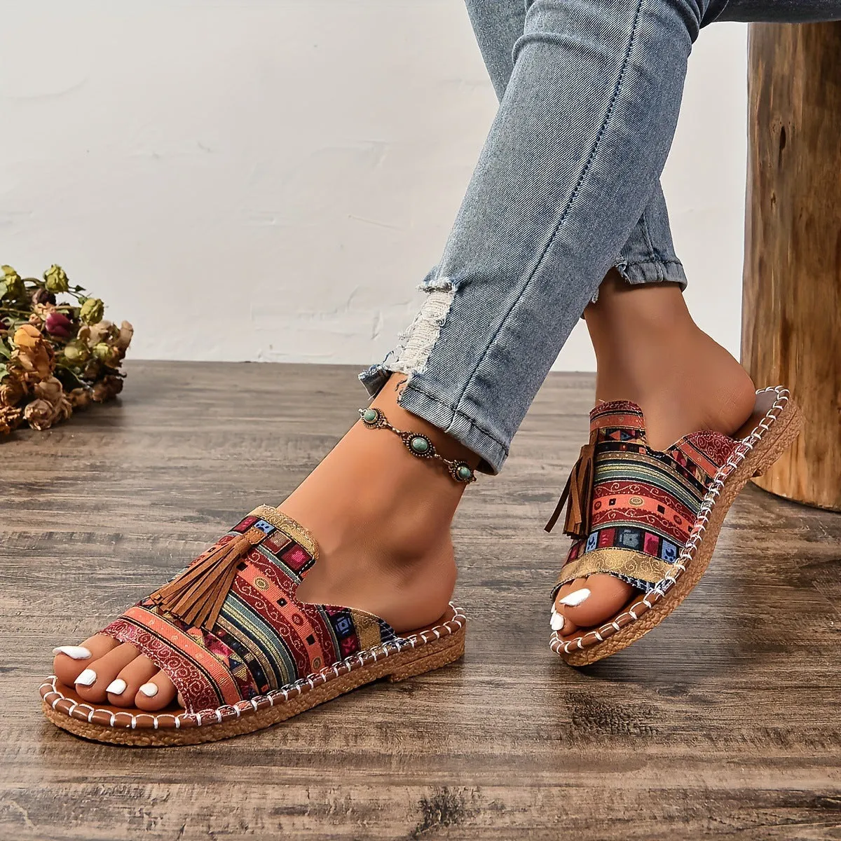 Women's tassel flat sandals in first layer cowhide with grape particle accents, Roman style, fish mouth toe, available in multiple colours