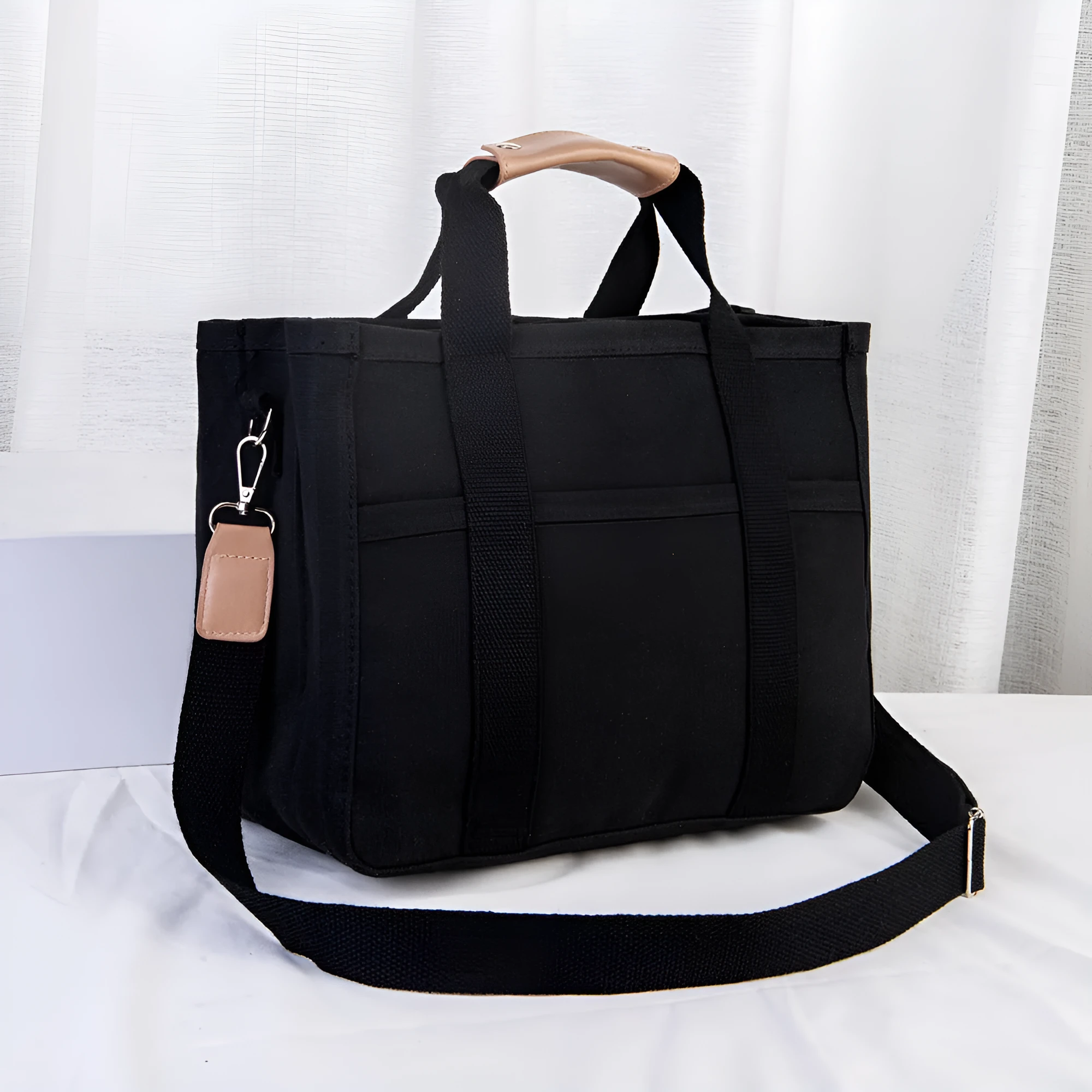 Canvas single shoulder crossbody bag in black, vertical square shape, 36x18x28cm, with zipper and buckle closure