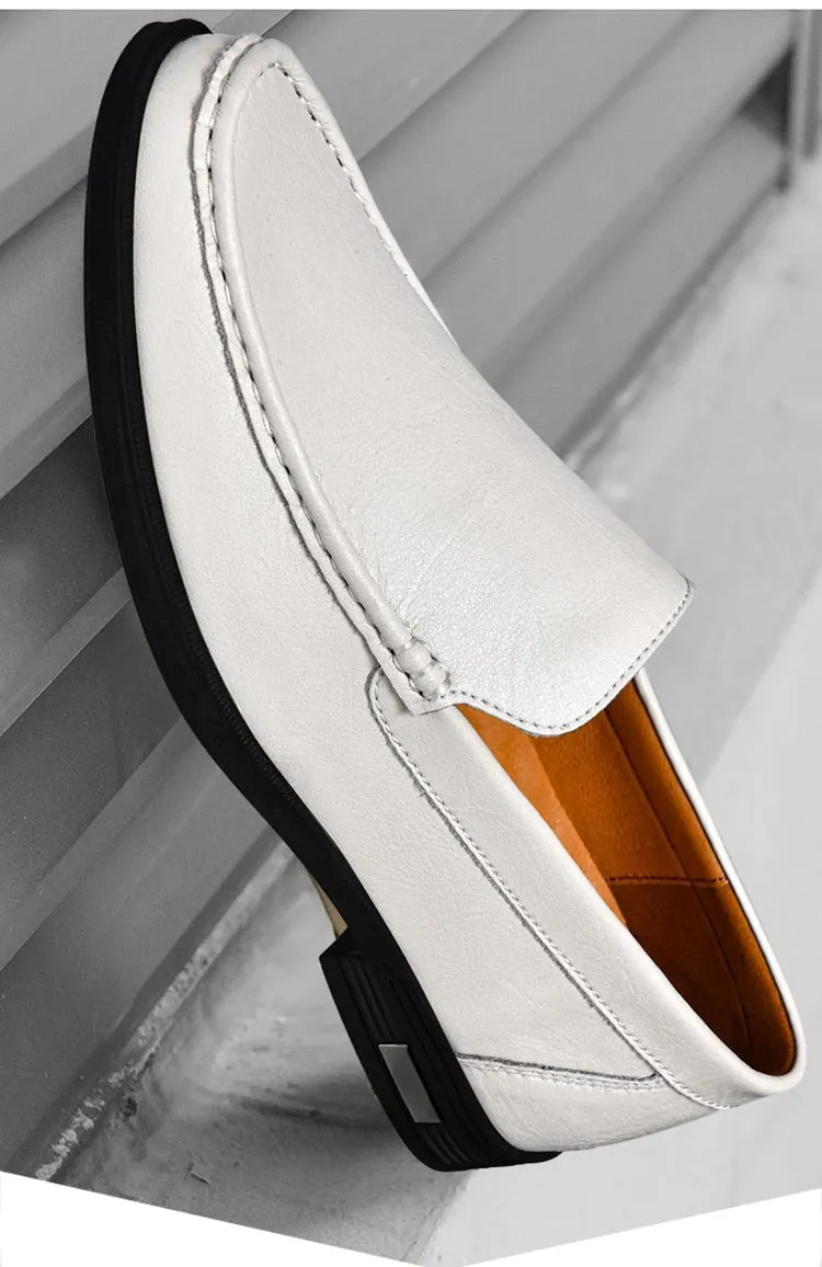Breathable brown leather casual shoes for men with round toe, car-stitching detail, and leather covers