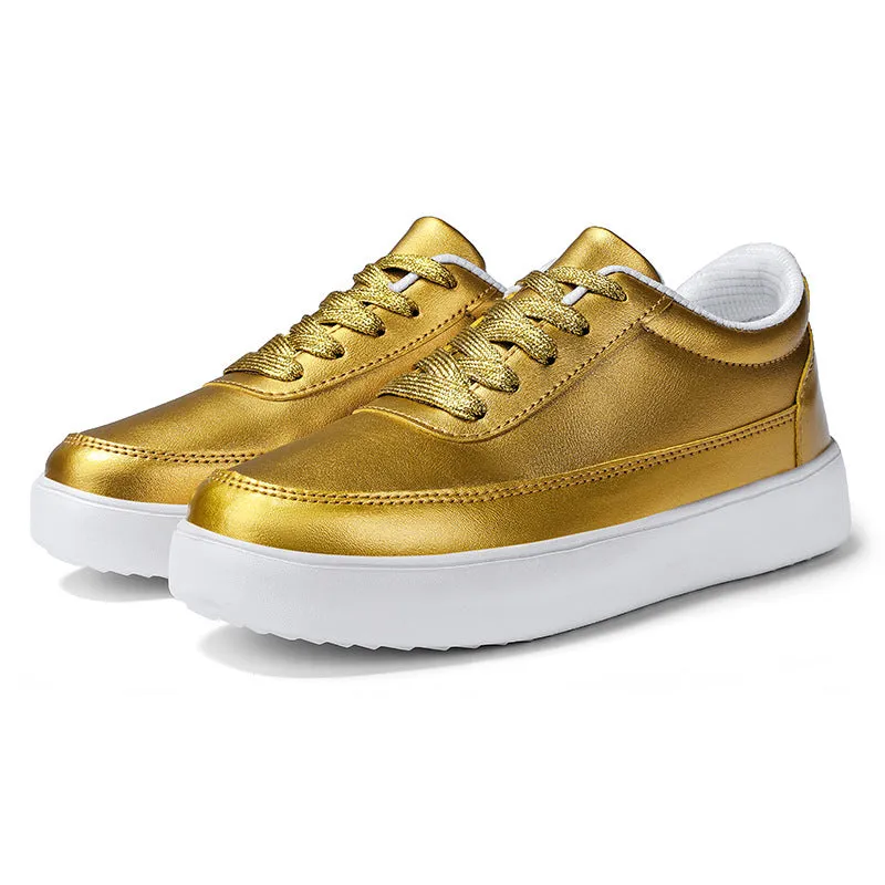 Women's gold leather lace-up flat casual shoes on a white background.
