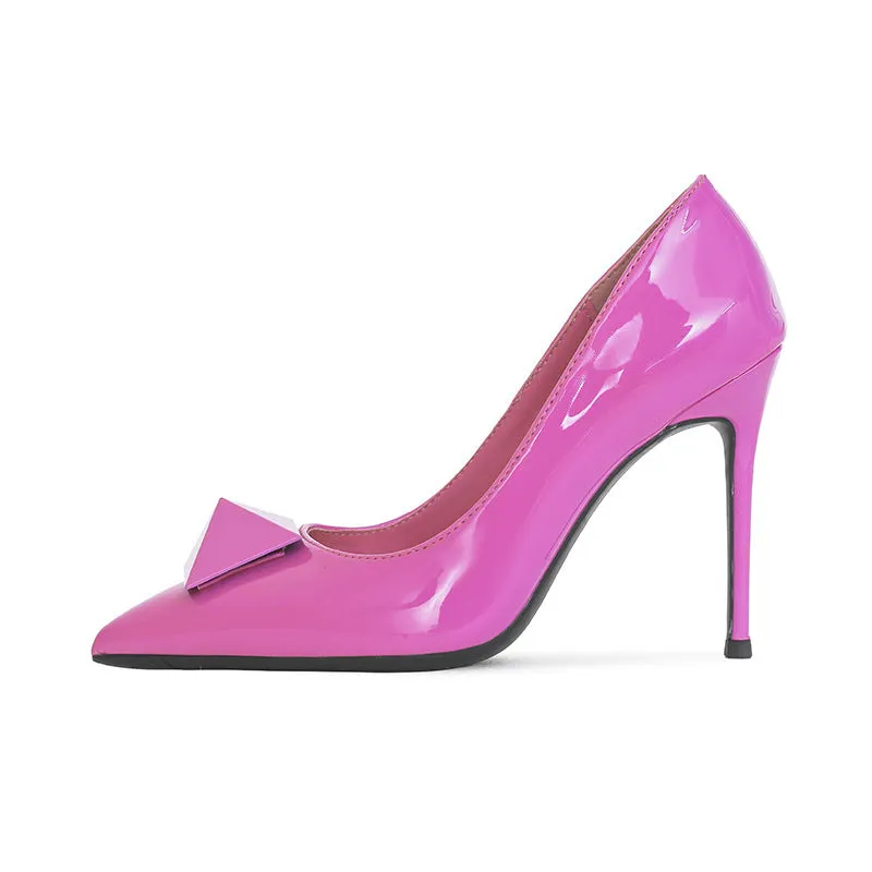 Women's pink patent leather pointed toe stiletto high heels with a buckle.