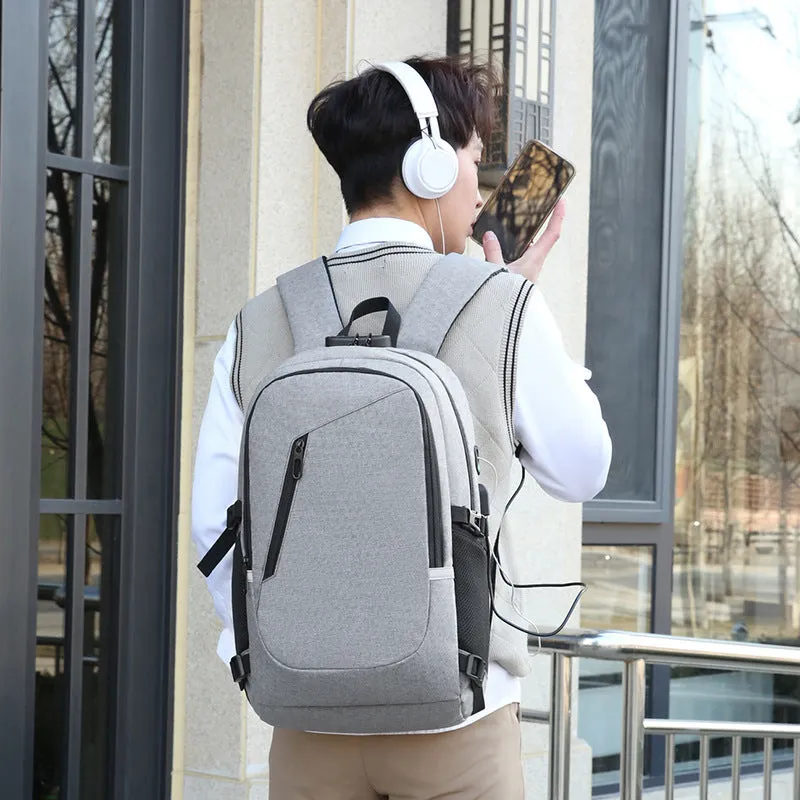 Men's Oxford cloth computer backpack in a solid colour with street style design.