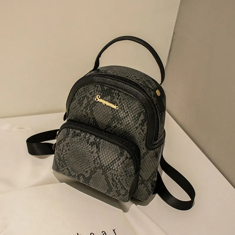 Girls' small PU backpack in Korean style with front pocket, in Snake White colour