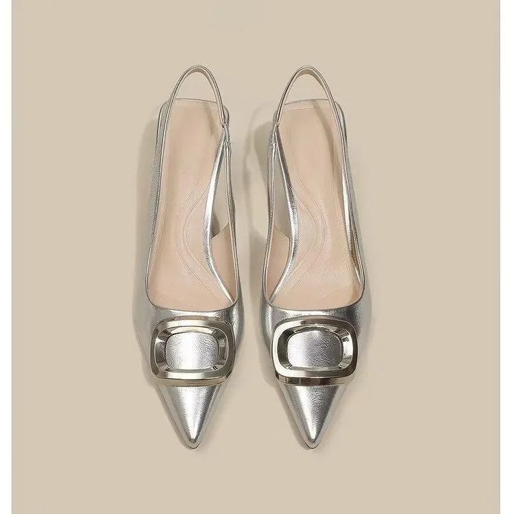 Pointed toe classy high heels with French square buckle in black, cream white, and silver. Microfiber and rubber construction. Sizes 35 to 39.