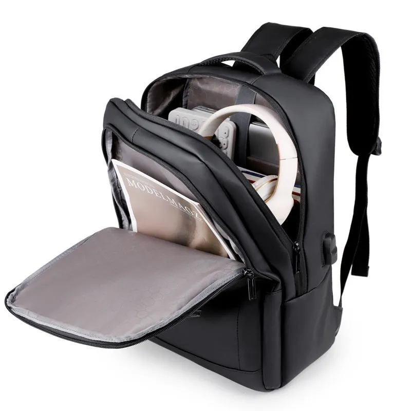 Waterproof laptop backpack in black with USB port and air pillow belt, 20-35L capacity