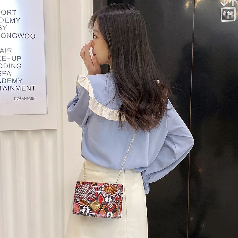 Rainbow Cloud Mist chain bag clamshell handbag PU leather crossbody in light gray with snake texture and chain detail