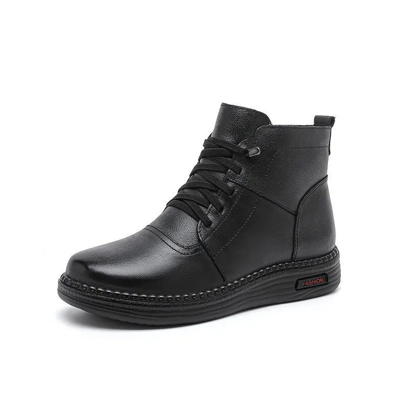 Mother cowhide leather ankle boots with wool lining, platform heel, and side zipper in black