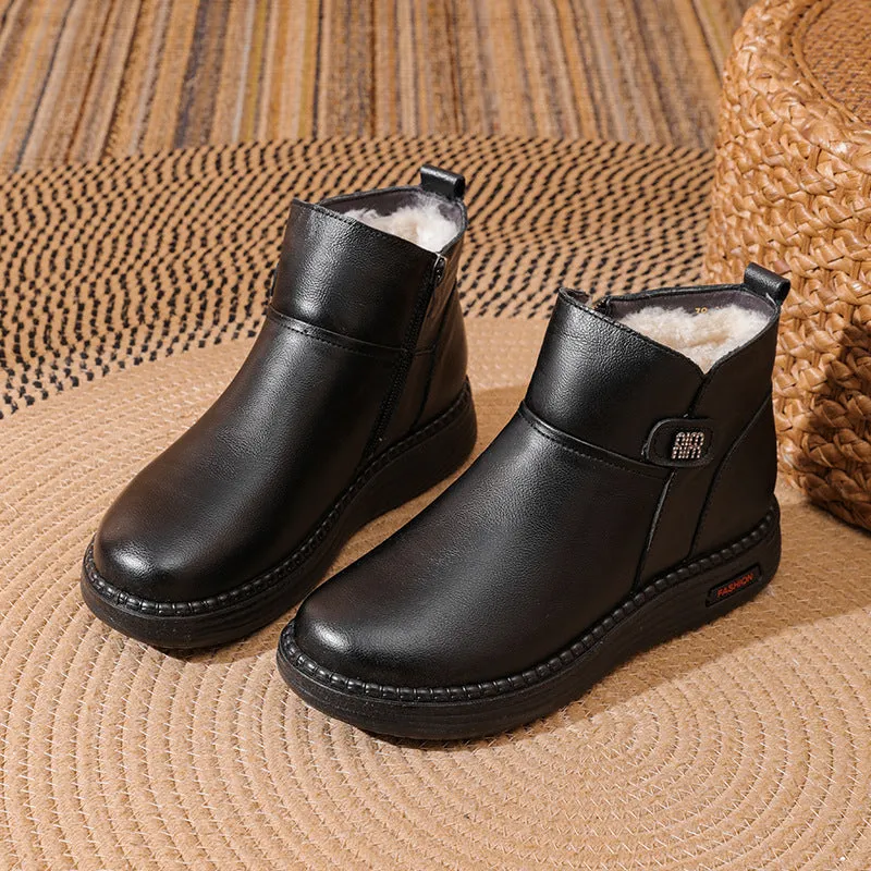 Mother cowhide leather ankle boots with wool lining, platform heel, and side zipper in black
