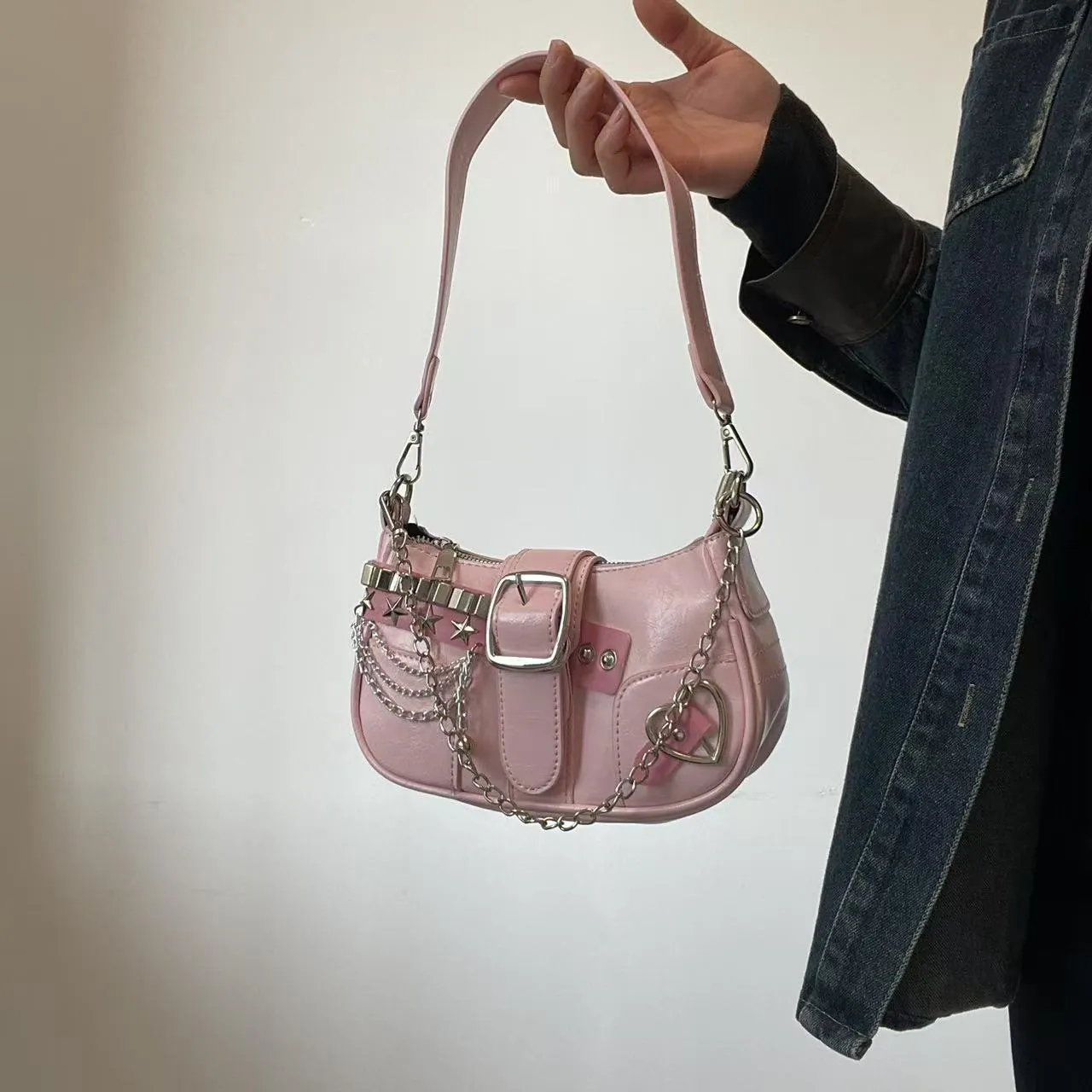 Women's soft PU underarm bag in pink with chain detail and three-dimensional outer pocket