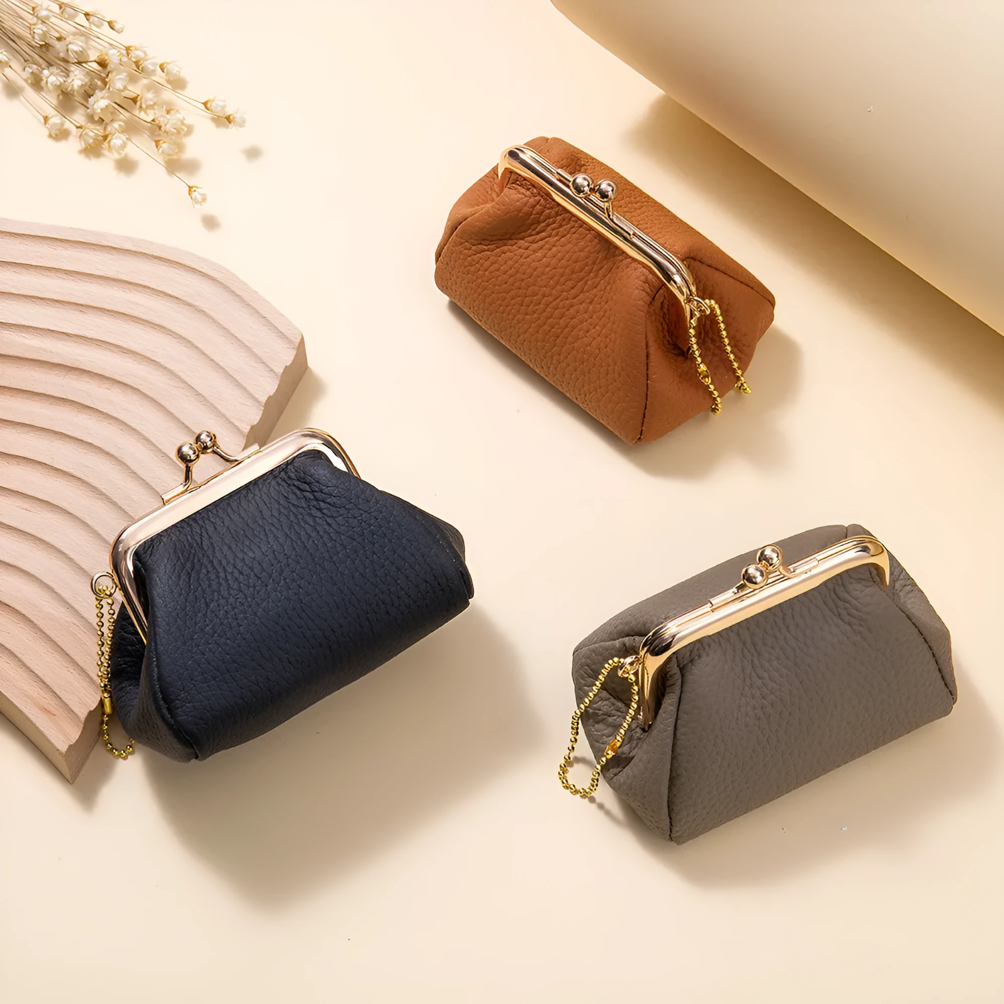 Genuine leather mini coin wallet in solid colour with visible sewing thread detail – urban simplicity design