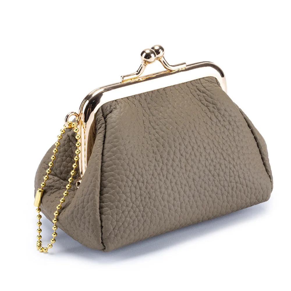 Genuine leather mini coin wallet in solid colour with visible sewing thread detail – urban simplicity design