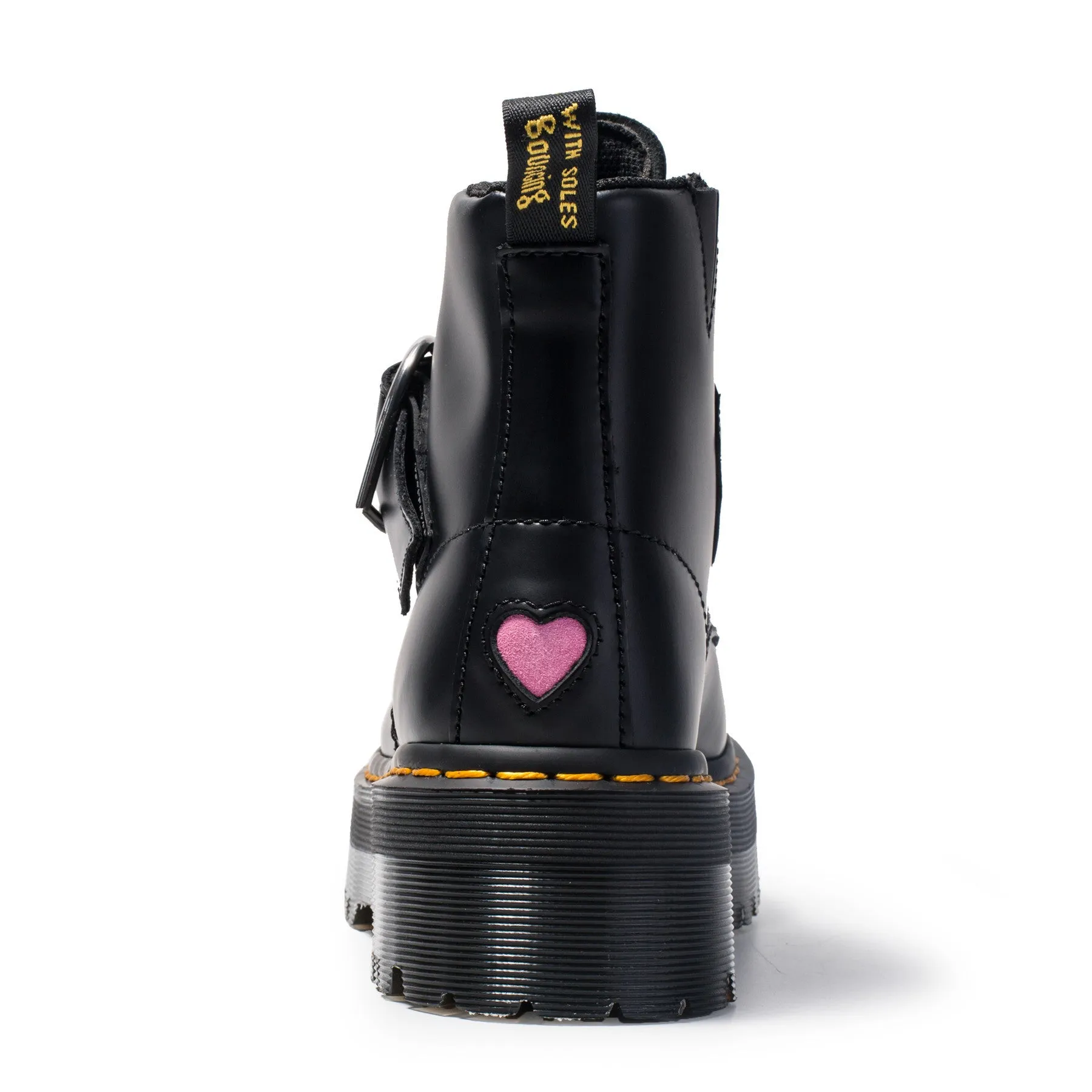 Women's black leather ankle boots with chunky heel, lace-up front, side zip, and belt buckle detail on a waterproof platform