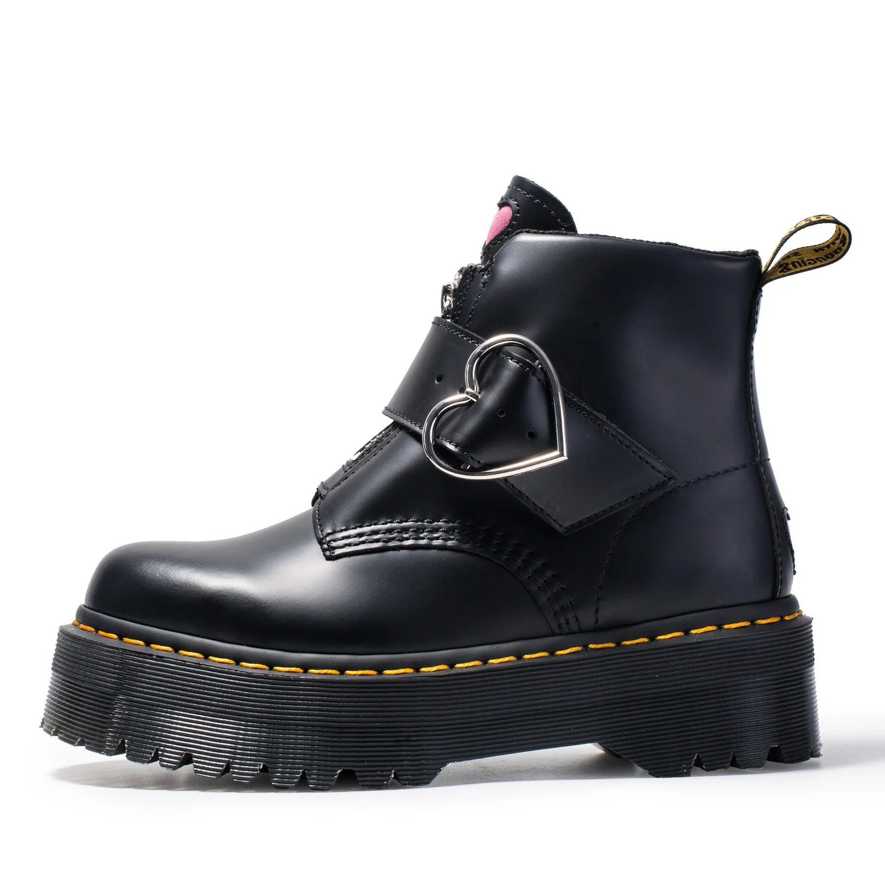 Women's black leather ankle boots with chunky heel, lace-up front, side zip, and belt buckle detail on a waterproof platform