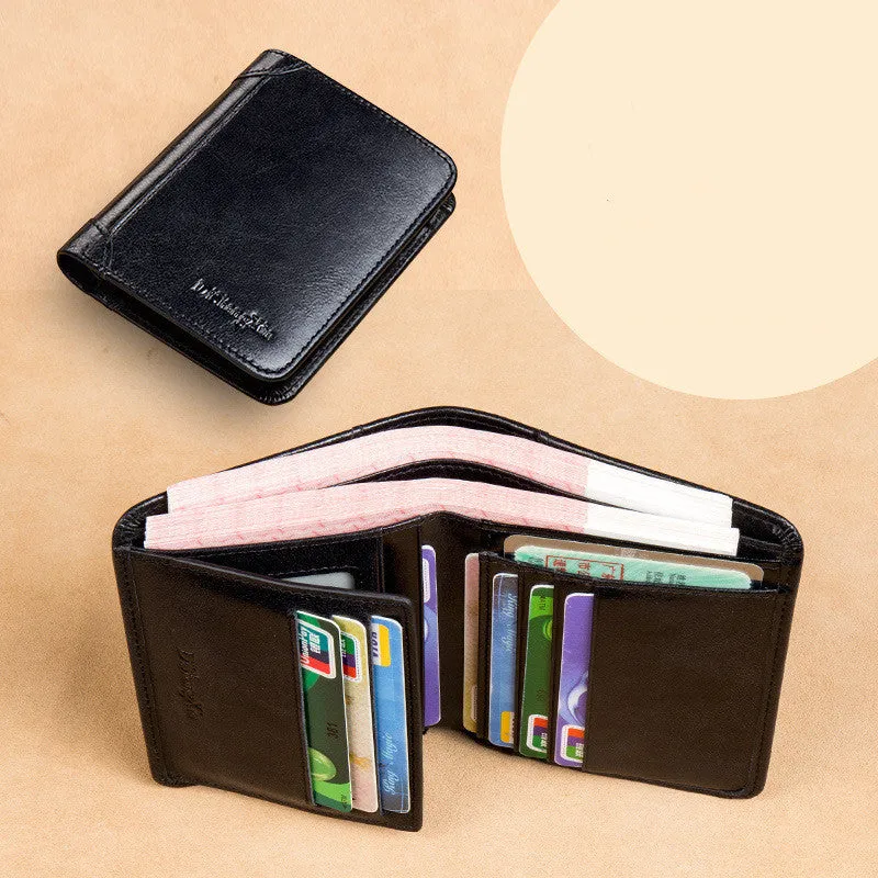 Men's black full-grain leather bifold wallet open, showing card slots, zip coin pocket, and banknote section.