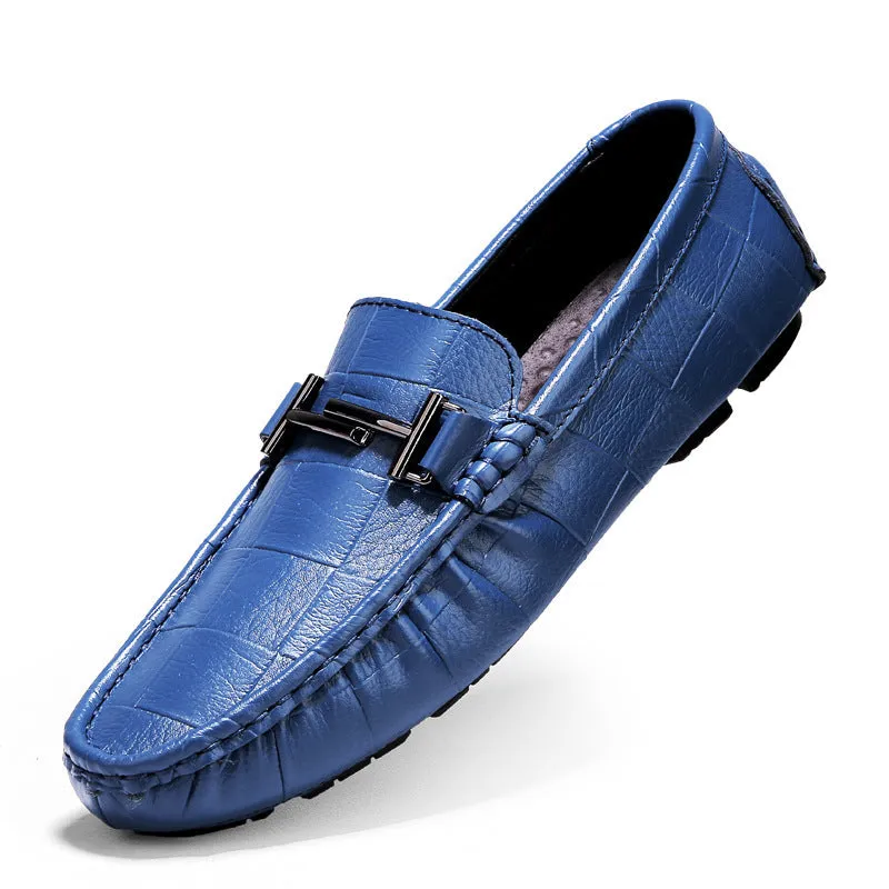 Men's leather brogue shoes in black with a belt buckle detail on a rubber sole