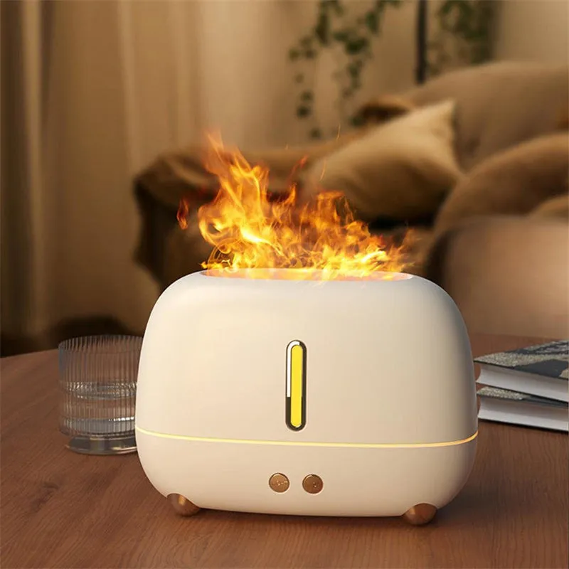 Dark grey flame humidifier with realistic orange LED light and mist output on a wooden table