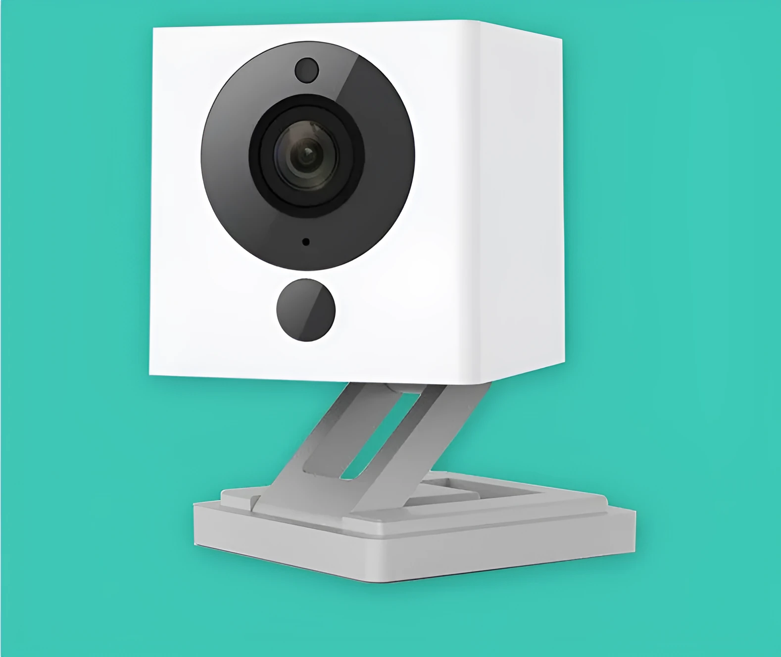 White compact indoor night vision security camera with 1080P resolution and 110° wide-angle lens on a shelf