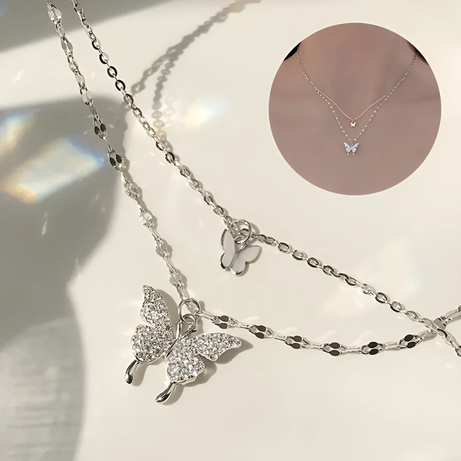 Silver colour double layer clavicle chain necklace with shiny butterfly pendant on copper base