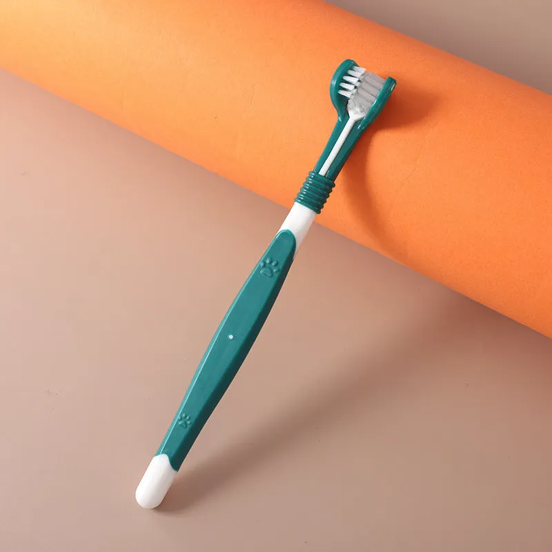 Pet toothbrush with nylon bristles and plastic handle in green colour
