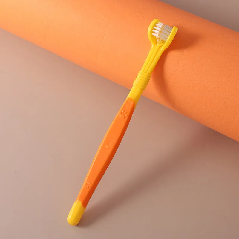 Pet toothbrush with nylon bristles and plastic handle in green colour