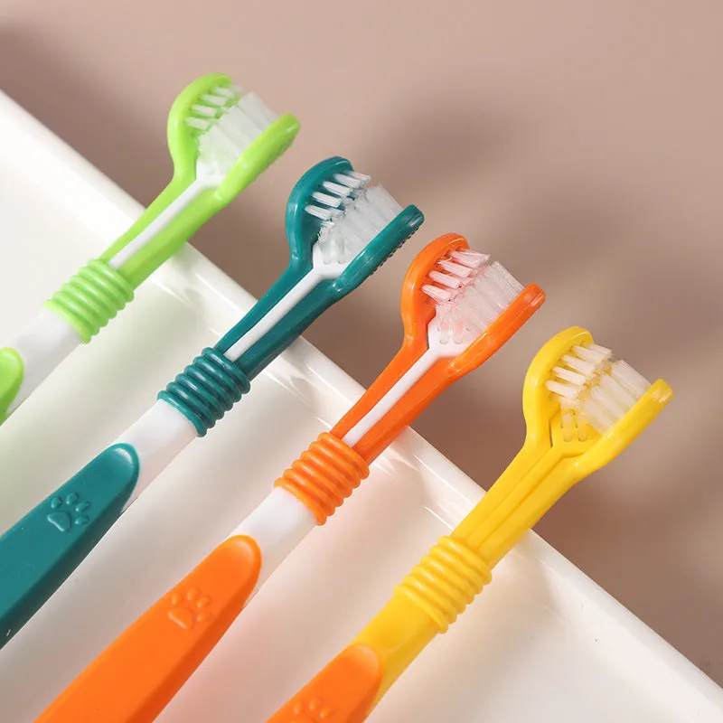 Pet toothbrush with nylon bristles and plastic handle in green colour