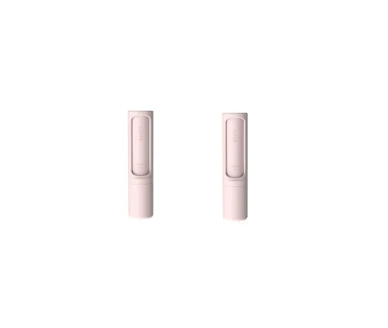 Rotating cylinder electrostatic pet hair removal brush in light pink with ABS body on a white background