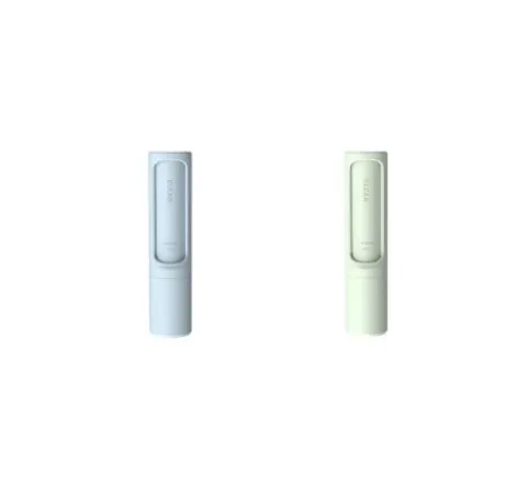 Rotating cylinder electrostatic pet hair removal brush in light pink with ABS body on a white background