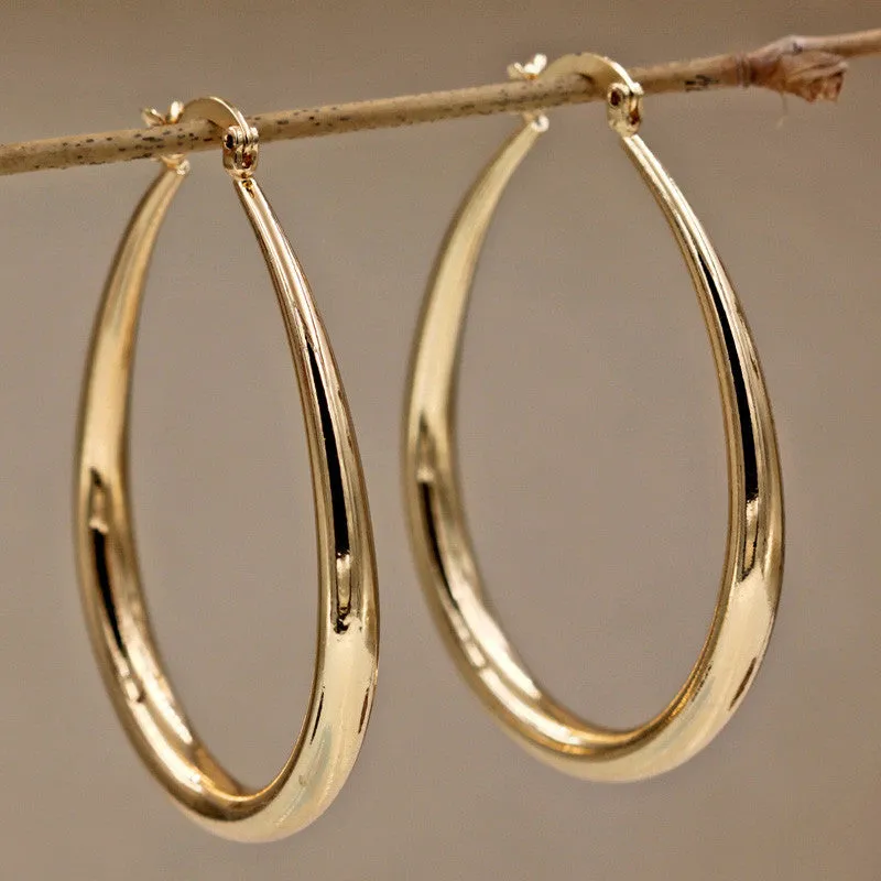 Geometric oval earrings for women, gold electroplated metal with alloy inlaid artificial gems