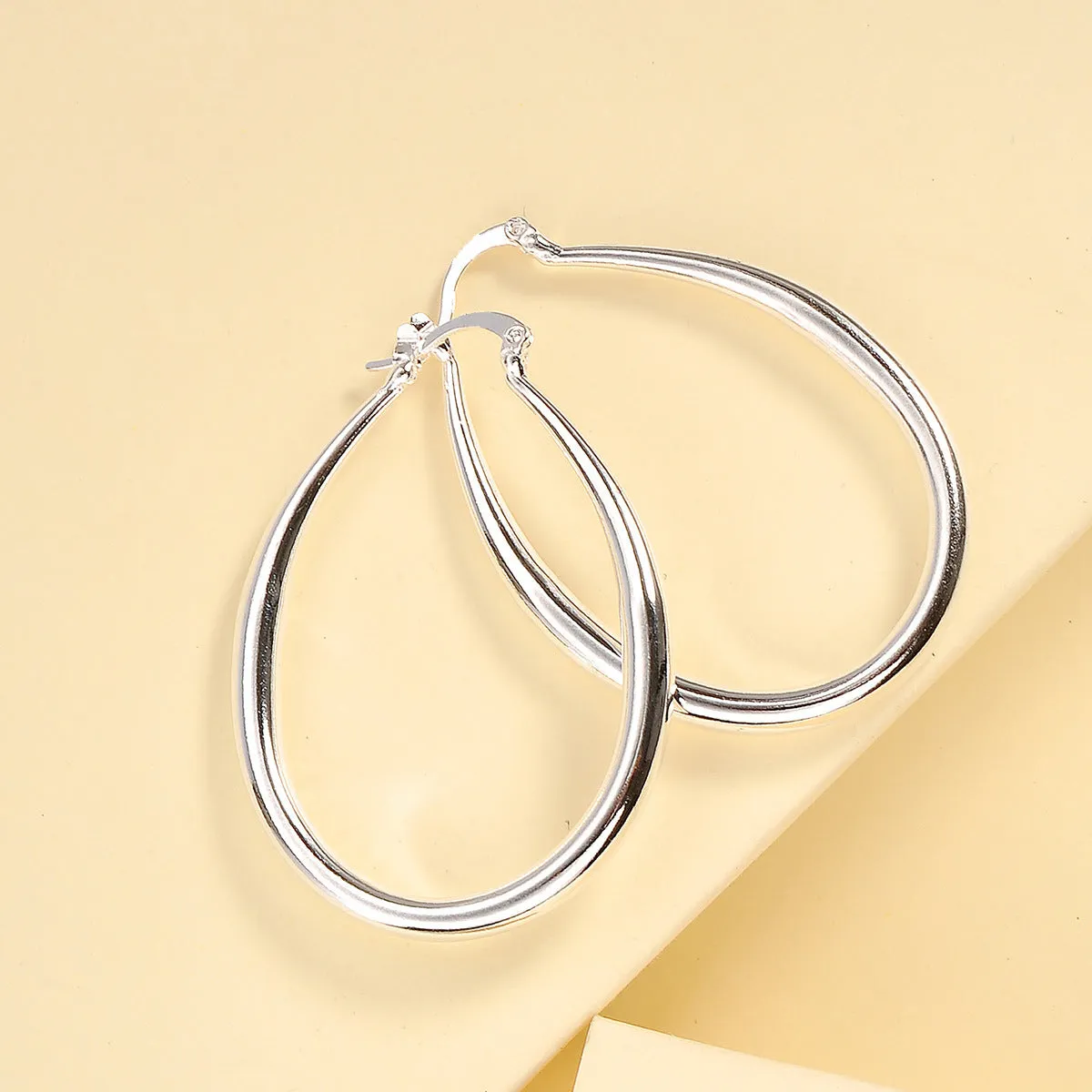 Geometric oval earrings for women, gold electroplated metal with alloy inlaid artificial gems