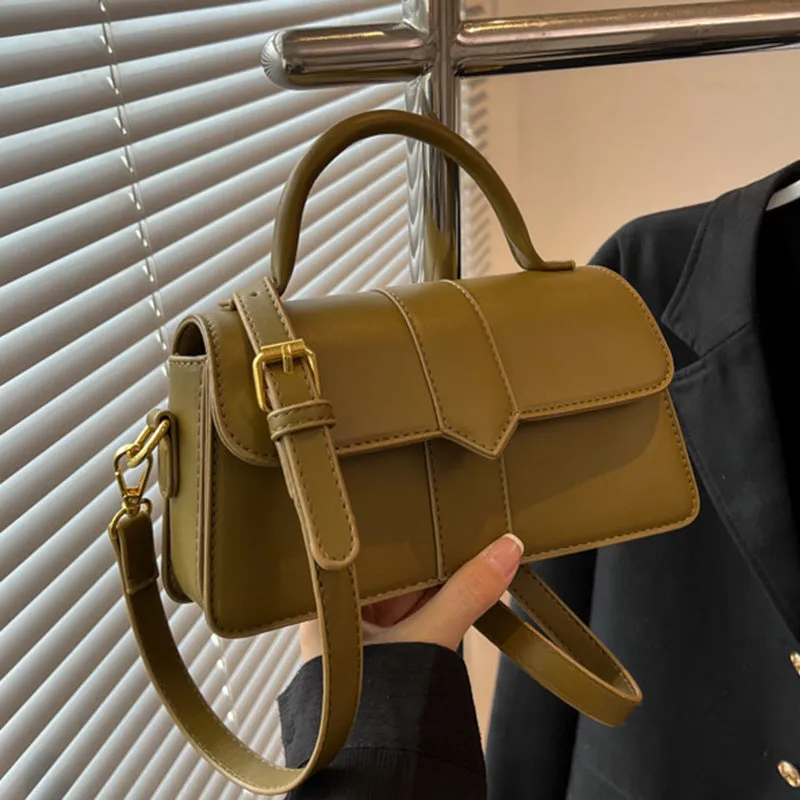 Women's PU leather messenger bag in neutral colour with file organiser interior and sandwich pocket